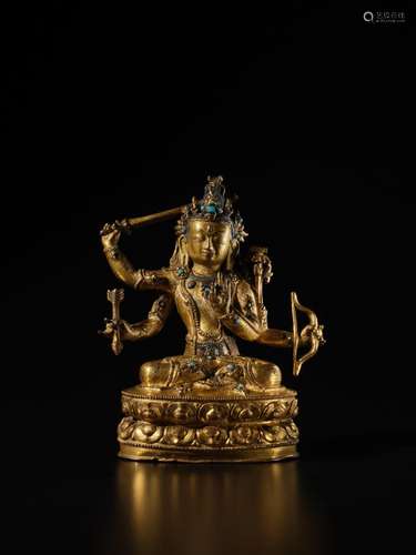 . A silver-inlaid gilt copper alloy figure of Manjushri, Tib...