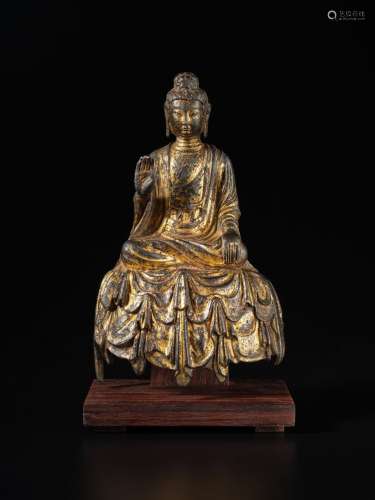 . A gilt-bronze figure of Buddha, Tang dynasty | 唐 銅鎏金佛...