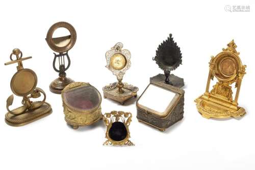 Lot consisting of eight watch holders in different materials...