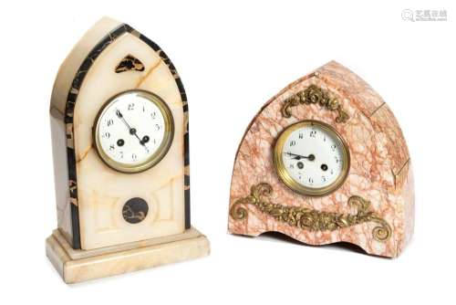 Lot consisting of two table clocks in marble and onyx, first...