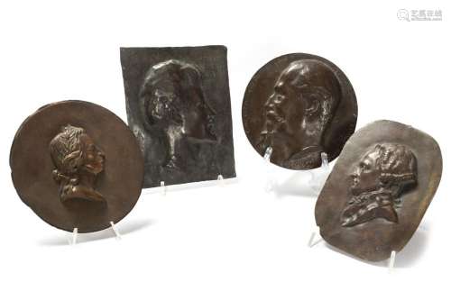 Lot consisting of four bronze plaques depicting portraits of...