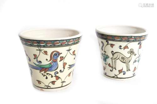 Pair of polychrome ceramic vases with zoomorphic elements