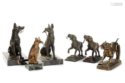 Lot consisting of six dog-shaped watch holders, early 20th c...