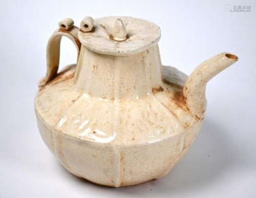 A Chinese Song style cream glazed teapot and cover