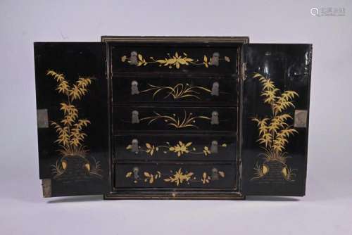 A Japanese black lacquered ko-dansu cabinet