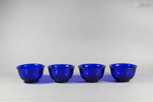 Four Chinese Peking blue glass bowls, late Qing or Republic