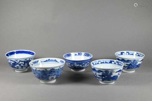 Five 19th century Chinese blue and white bowls with Kangxi m...