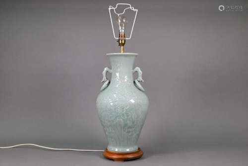 A Chinese celadon prunus vase