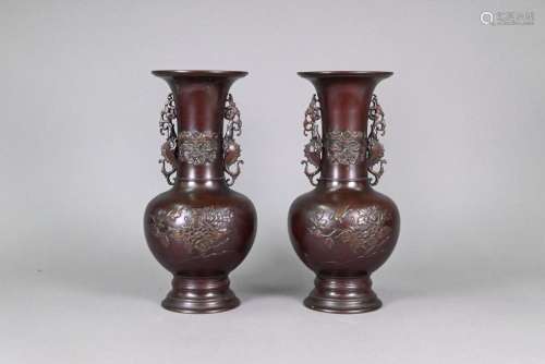 A pair of Japanese bronze vases