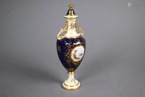 A Coalport small china baluster vase and cover