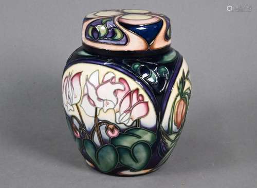 A Moorcroft 'Ashwood Gold' and other designs jar and...