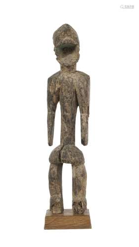 Statuette Mumuye, bois à patine brun-noir et pigments bleu c...