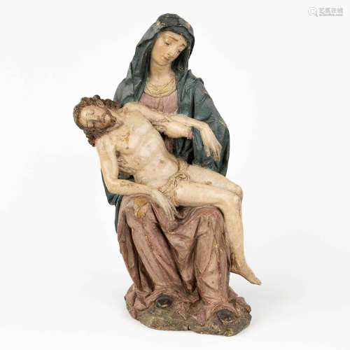 An antique Pietà, patinated terracotta. 17th C. (L: 17 x W: ...