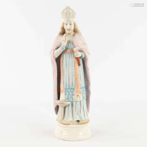 A bisque porcelain figurine of Saint Eligius. (H: 32 x D: 9,...