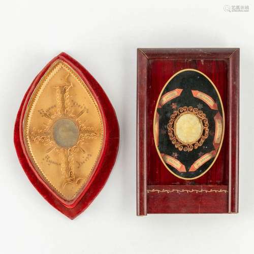 A collection of 2 'Agnus Dei' wax seals, decorated with the ...