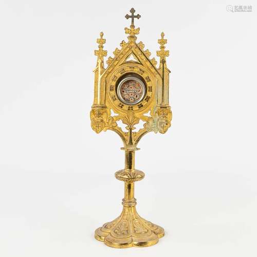 A monstrance with 10 relics, brass, first half of the 20th C...