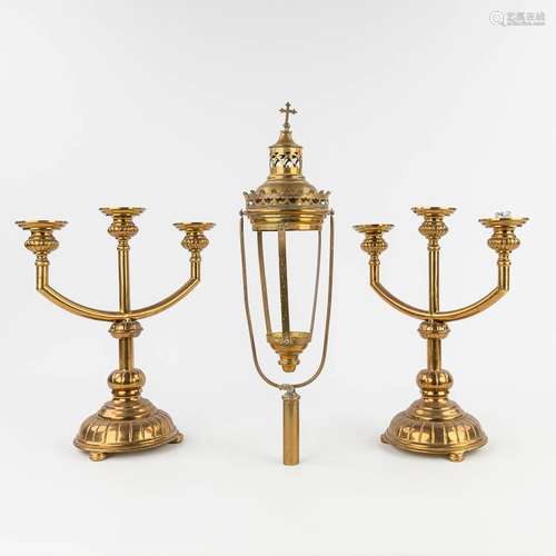 A pair of candlesticks and a procession lamp. 20th century. ...