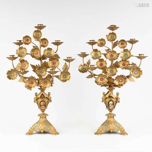 A pair of candelabra, gothic revival style, made of brass. (...