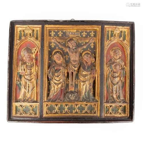 A religious Triptych made of patinated plaster in gothic rev...