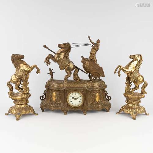 A three-piece mantle garniture clock with side pieces, bronz...