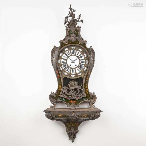 A Kartell clock on a stand, 'Thuret à Paris' with hand-paint...
