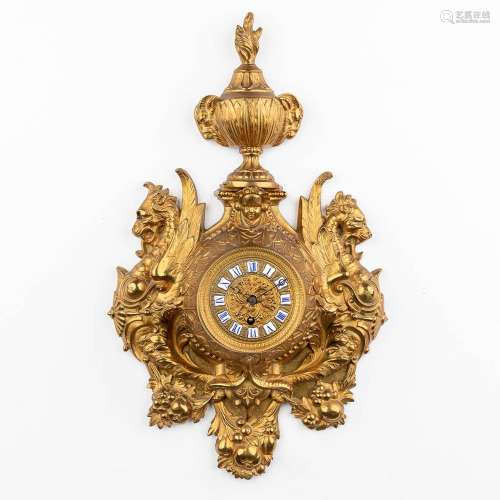 A Kartell clock, bronze decorated with mythological figurine...