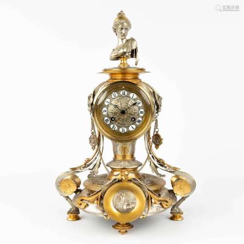 A mantle clock made of bronze in Louis XVI style. Circa 1900...