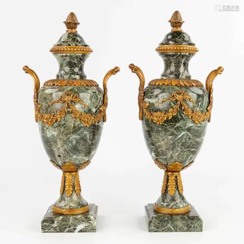 A pair of cassolettes made of green marble, mounted with gil...