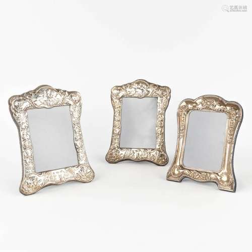 A collection of 3 silver picture frames, made in England. Sh...