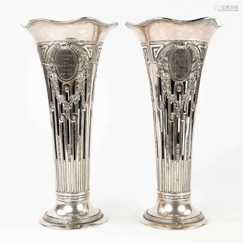 A pair of vases made of silver and marked 800. Made in Germa...