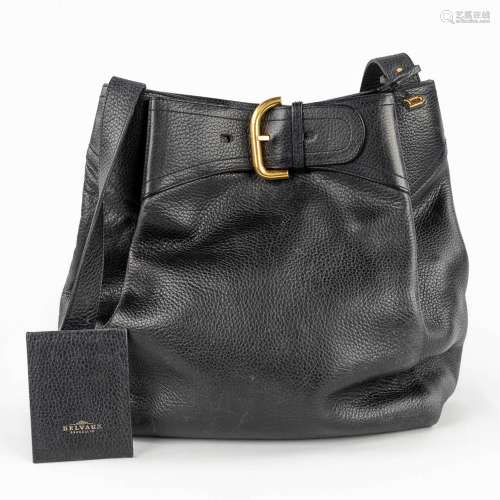 Delvaux Souverain, a handbag made of black leather and gold-...