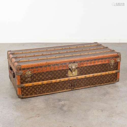 Louis Vuitton, an antique traveller's suitcase, fabric over ...