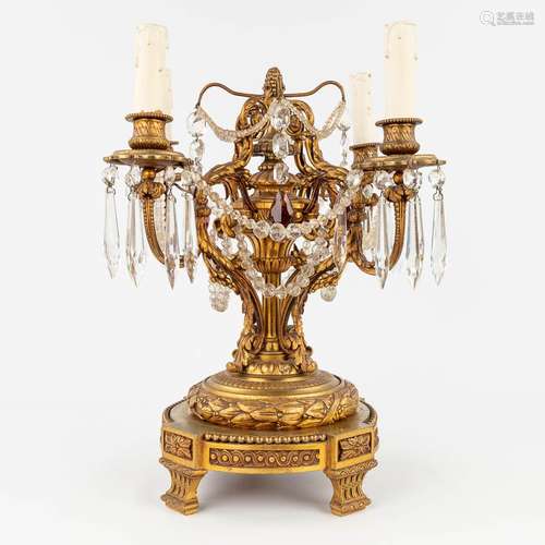 A girandole table lamp made of bronze in Louis XVI style. (L...