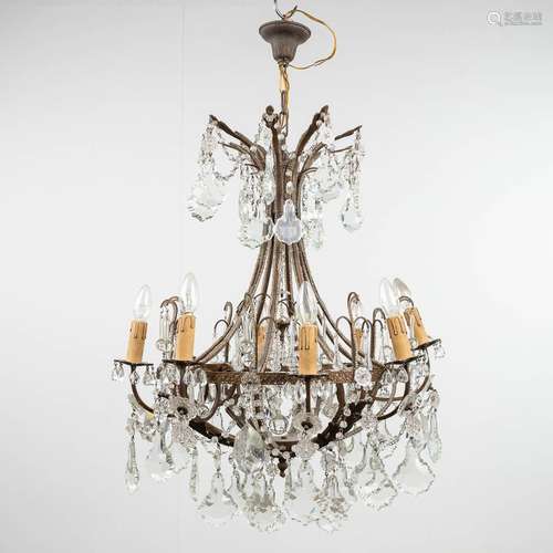 A large and decorative chandelier, with glass. Circa 1950. (...