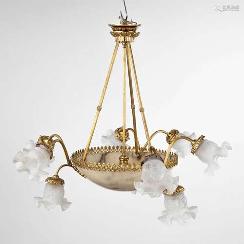 A chandelier made of bronze with an alabaster bowl and glass...