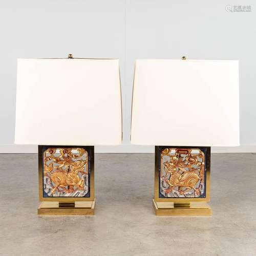 A pair of Chinoiserie style table lamps finished with sculpt...