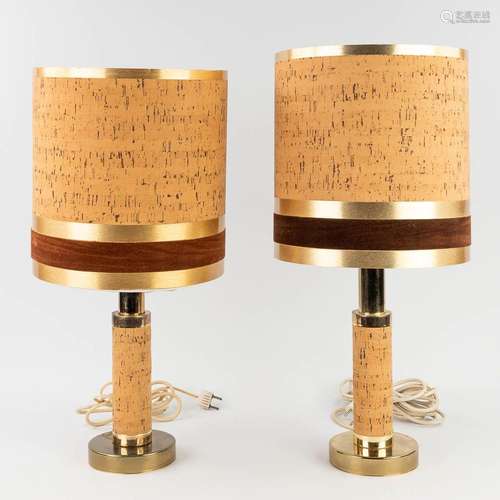 A pair of mid-century table lamps, brass decorated with cork...