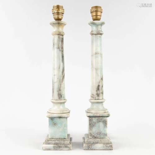 A pair of table lamps made of onyx. (H: 54 cm)