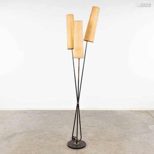 A floorlamp made of metal. Circa 1950. (H: 181 cm)