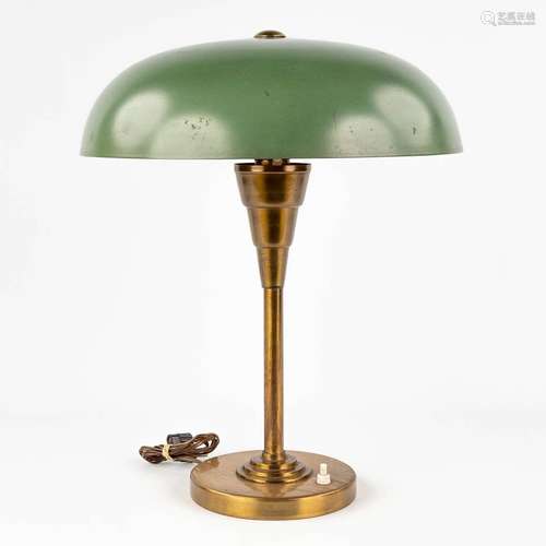 A table lamp with green shade, art deco style. Circa 1920-19...