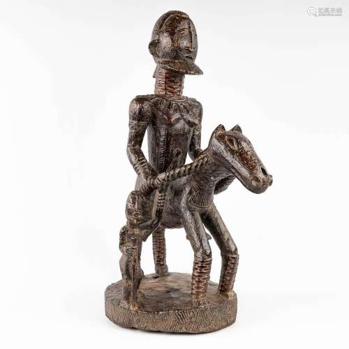 Dogon, an African statue of a rider on a horseback. (L: 50 x...