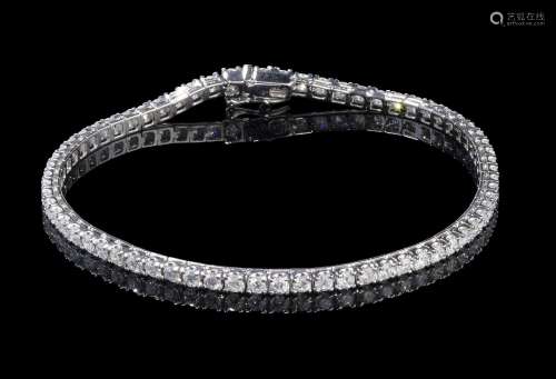 Bracelet tennis serti de diamants (env. 3 ct)<br />
Travail ...