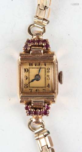 A gold and ruby lady's dress wristwatch