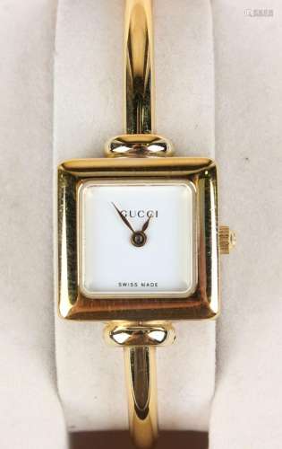 A Gucci gilt plated steel cased lady's bangle wristwatch