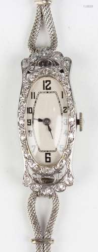 An 18ct white gold and diamond set lady's dress wristwatch