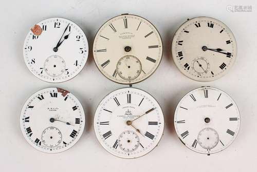 A large collection of pocket watch movements and dials