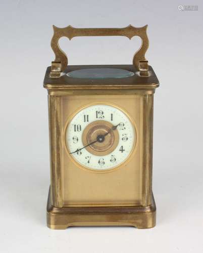 An early 20th century brass cased carriage timepiece with ei...