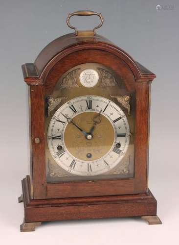A mid-20th century George III style mahogany mantel clock wi...