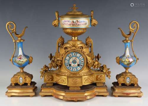 A late 19th century French ormolu and porcelain mantel clock...