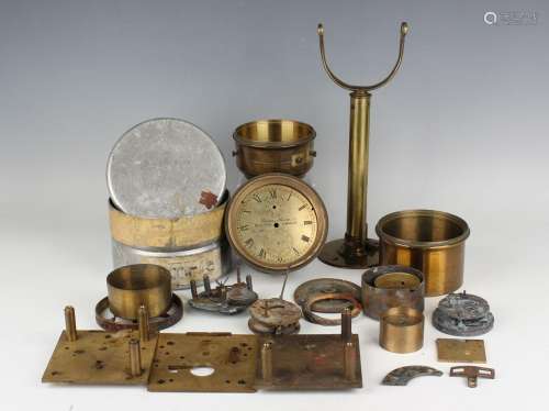 A collection of various ship's chronometer parts